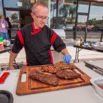 Chef Phillip Dell getting ready to cut into this beautiful grilled steak