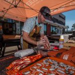 Traeger Representative Taylor Prepping Meat Before Smoking